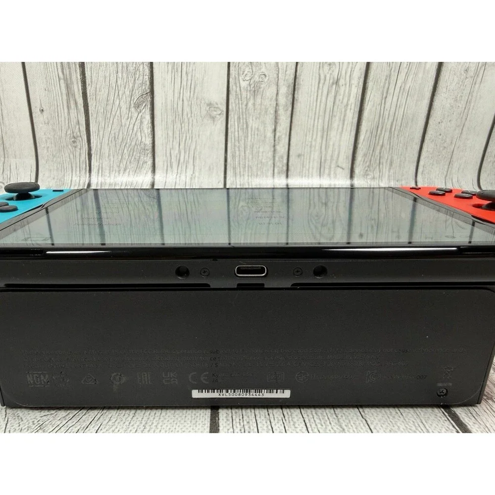 Nintendo Switch OLED  Blue Red Bundle Mint Condition Used Twice Adult Owned Case